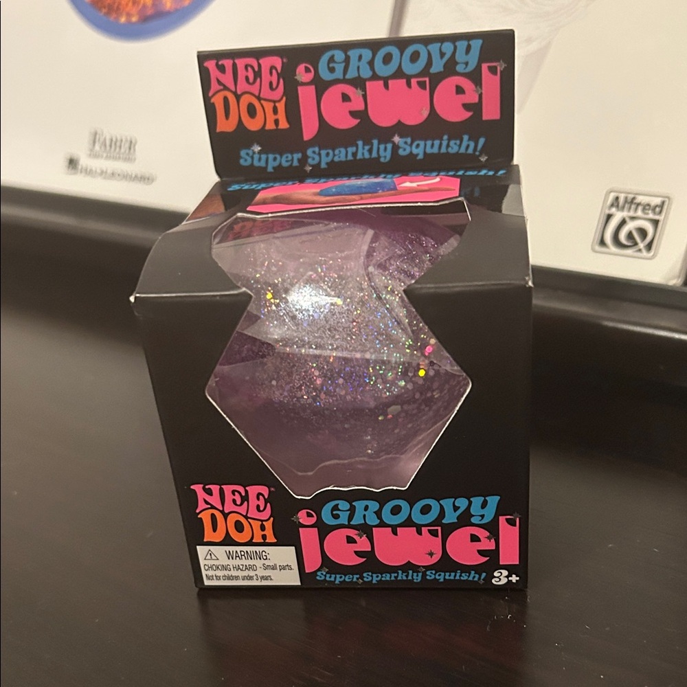 Groovy Jewel Purple Sparkly Squish Toy